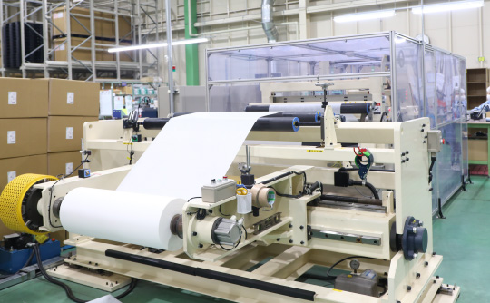 シーツ折り加工機