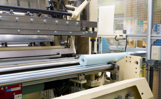 ミシン目加工機